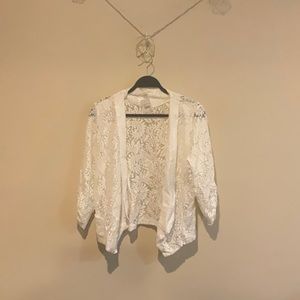 Woman’s white lace jacket